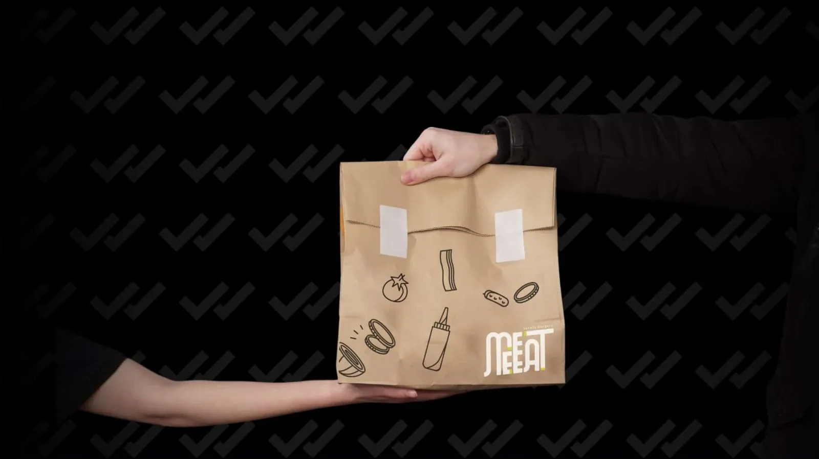 A bagged order being checked before it is handed over