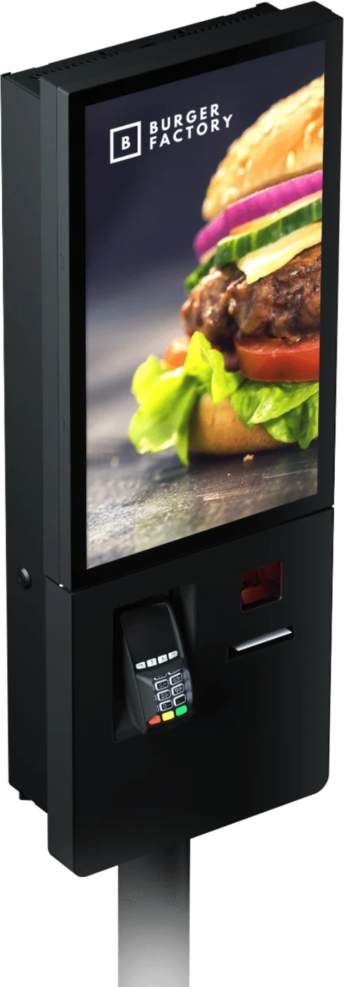 Self-order kiosk showing a burger on screen